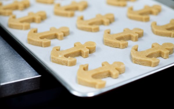 Sugar cookies shaped like anchors.