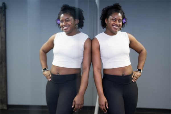 Valarie James, owner of VSJ Fitness, poses for a photo in her studio