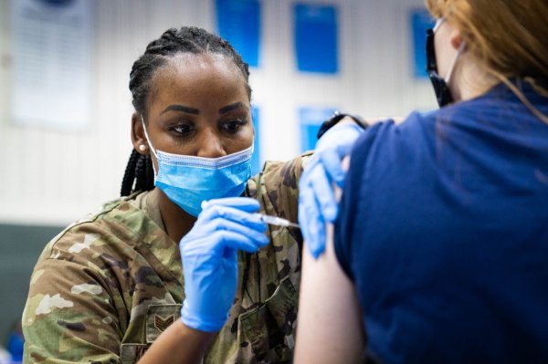 Members of the National Guard helped administer the Pfizer vaccine at the GVSU clinic held in the Fieldhouse.