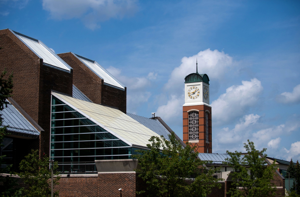 exterior photo of Kirkhof Center roof with Cook Carillon Tower in background