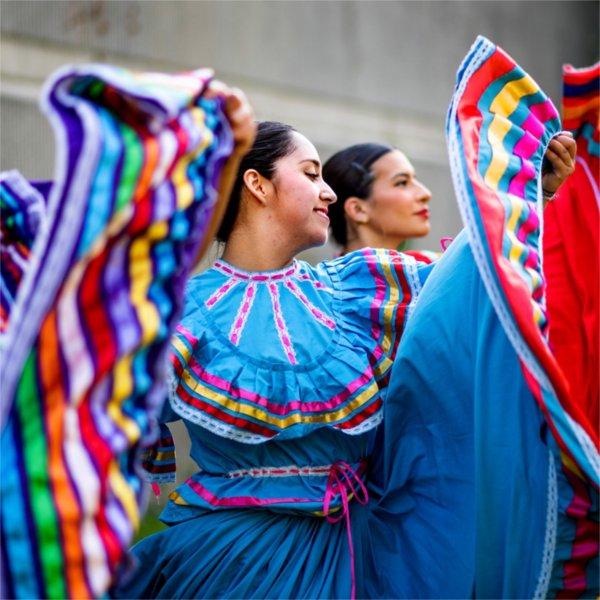 Members of student group Monarcas perform a dance together.