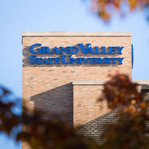 Grand Valley State University sign attached to exterior of Seidman College of Business