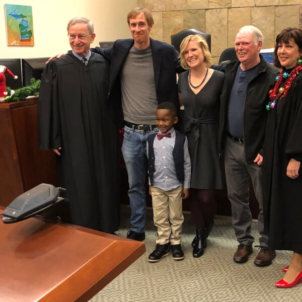 From left, Michigan Supreme Court Justice Stephen J. Markman, David Eaton, Michael, Andrea Melvin, George (maternal Grandfather) and Kent County 17th Circuit Court Judge Patricia Gardner.