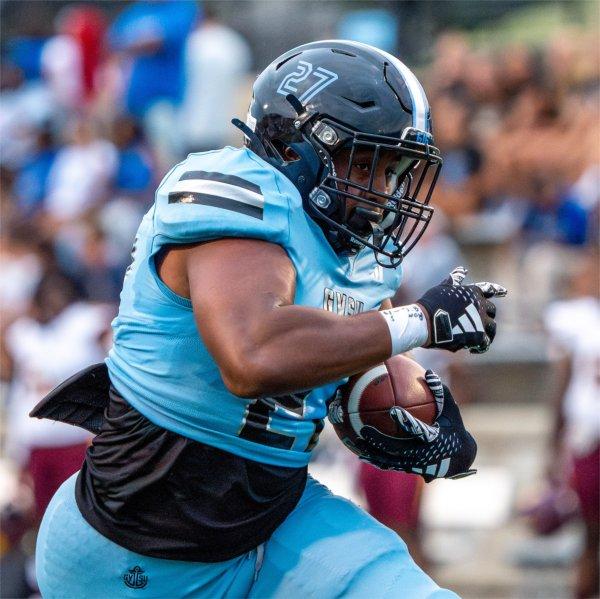 GVSU sophomore running back Khalil Eichelberger runs against Central State at Lubbers Stadium on September 5.