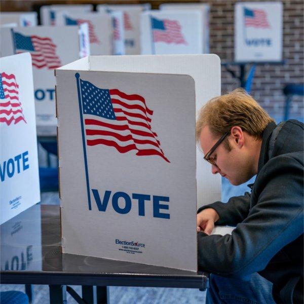 Philosophy major Conrad McIntosh votes at the Kirkhof Center on November 1.