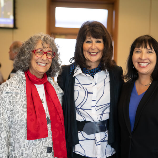 From left, Diana Lawson, dean of the Seidman College of Business; President Philomena V. Mantella; Sonja Johnson, executive director of the Van Andel Global Trade Center.