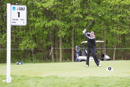 President Thomas J. Haas hits off hole No. 1 at the Meadows May 13, the first day of the NCAA Division II Women's Golf National Championship.