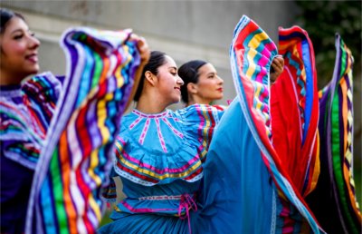 Members of student group Monarcas perform a dance together.