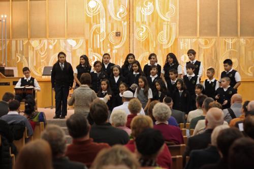 The Children of San Juan Diego Academy Choir perform at the 2013 Interfaith Thanksgiving Celebration.