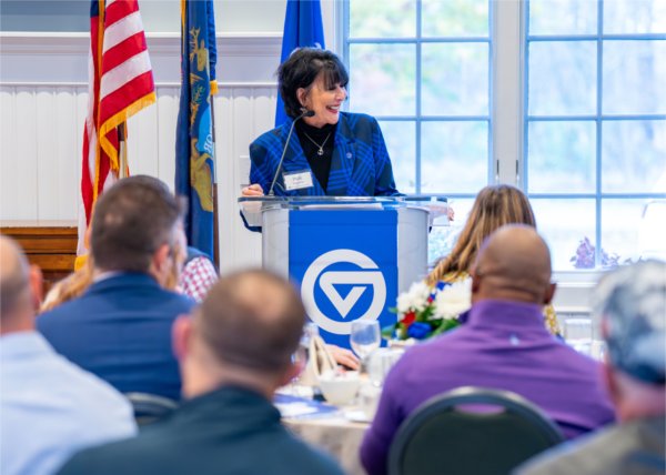 GVSU President Philomena V. Mantella at the podium.