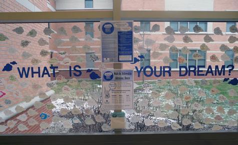 The Dream Big board, where students share goals they can achieve through fellowships and scholarships, is on display in the foyer of Niemeyer Hall on the Allendale Campus.