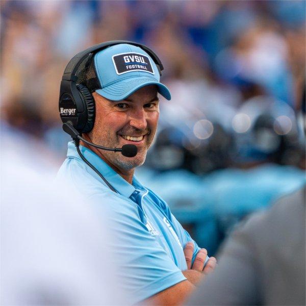 GVSU football head coach Scott Wooster reacts after a touchdown against Central State at Lubbers Stadium on September 5.