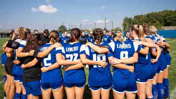 Grand Valley women's soccer team huddles before a game.