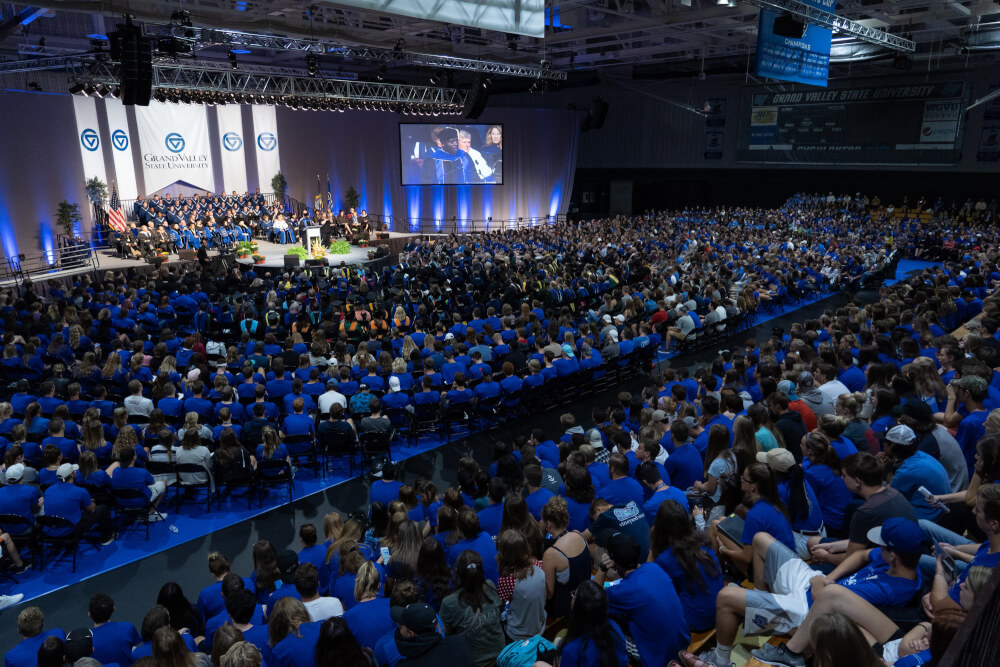 A wide-angle, crowd shot of a Grand Valley State University Convocation ceremony.