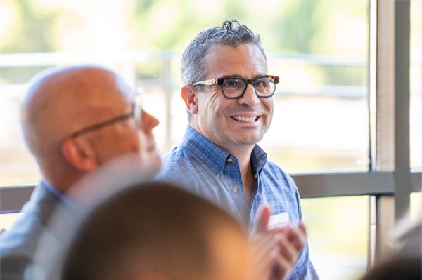 Joseph Van Harken, innovator in residence at GVSU, smiles after speaking as part of the Tech Talks series focused on AI and Data at the John G. Russell Leadership Building in Grand Rapids on September 18.