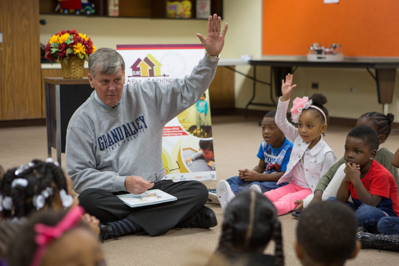 President Haas read The Sandwich Swap to preschool students at Explore and Learn Academy in Grand Rapids.
