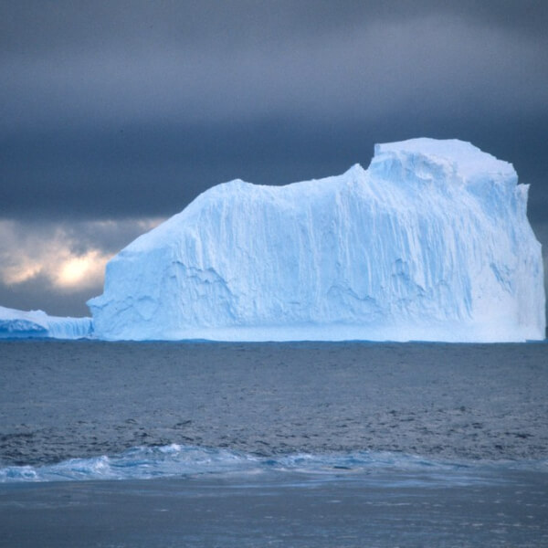 An iceberg in the ocean.