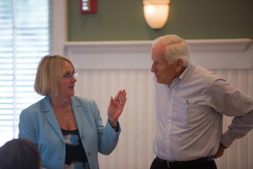 Bonnie Wesorick talks with Barry Johnson at the Institute for Polarity Thinking in Health Care, held June 15-17 at the Alumni House.