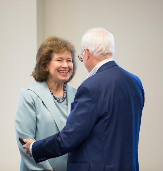 New board chair John C. Kennedy talks with Provost Gayle Davis, who will retire in 2017.