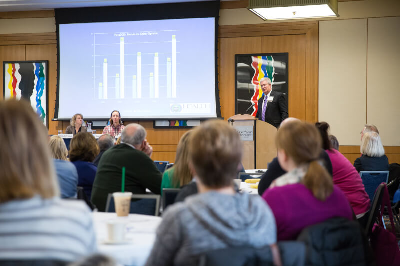 Mark Hall, Kent County Health Department medical director, presents local statistics on opioids.