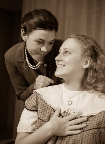 German exchange student Hannah Beck as Helga, with her (young) daughter Eva, performed by student Mallory Caillaud-Jones.