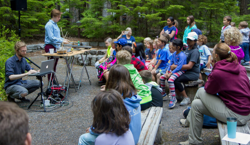 The New Music Ensemble performing at Mount Rainier National Park.