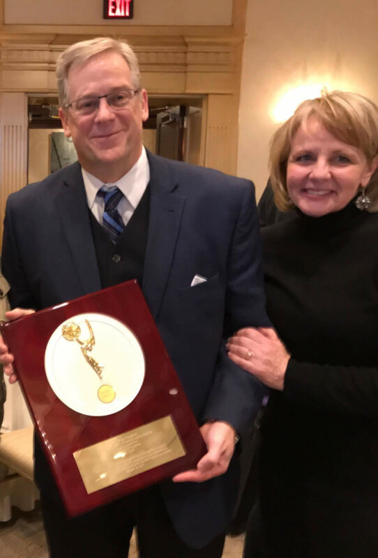 Jay Lowe, assistant general manager of WGVU Public Media, is pictured at the awards ceremony in Birmingham, Michigan, with his wife Colleen Lowe.