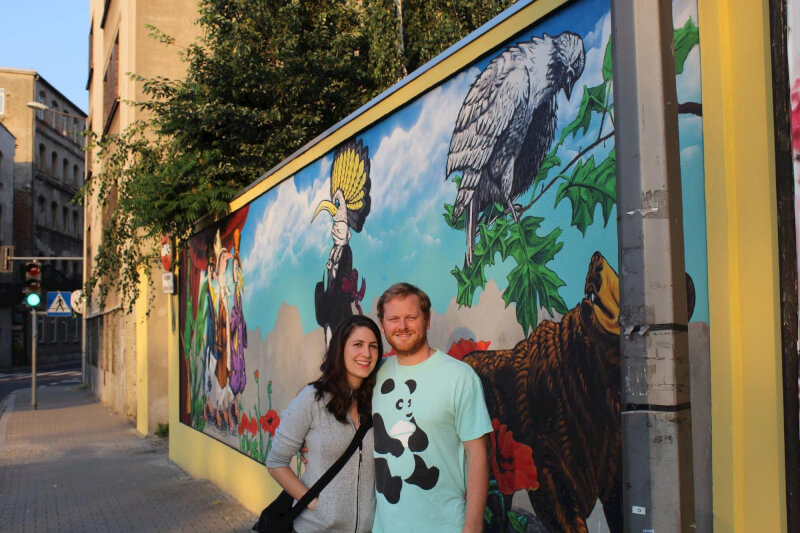 Sean, '16, and Megan, '15, Hamilton pictured in front of the Bielsko Biala mural. Photo courtesy of Sean Hamilton.
