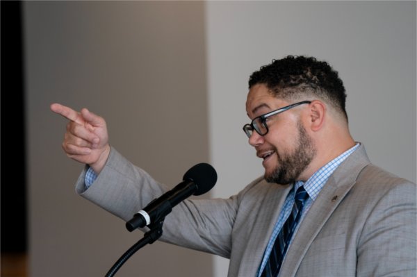 Danny Vélez, GVSU associate vice president for admissions and recruitment, speaks during the LatinXperience Symposium at the Holland Civic Center  on July 16.