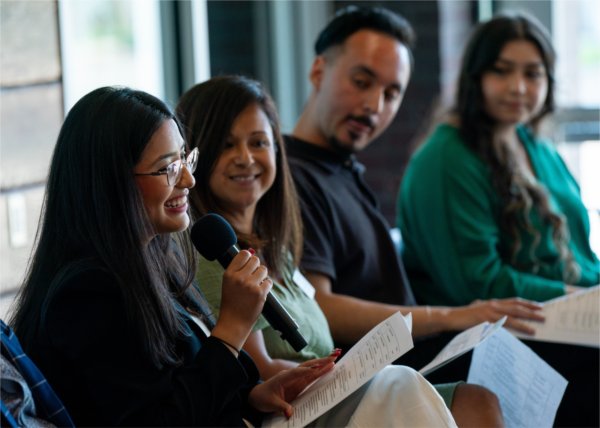 Panelists at the LatinXperience Symposium answer a question from an audience member.