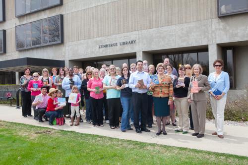 Library staff members participated in a Book Walk ceremony