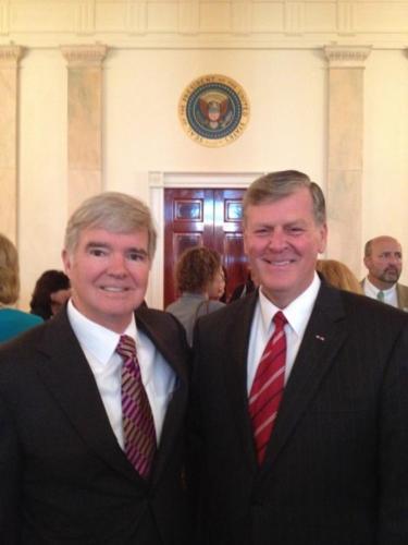 Mark Emmert, president of NCAA, and President Thomas J. Haas are pictured at the White House following an announcement by the NCAA and Department of Defense.