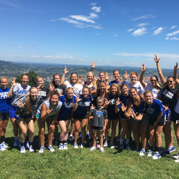 The GVSU Volleyball team poses for a picture in Slovenia.