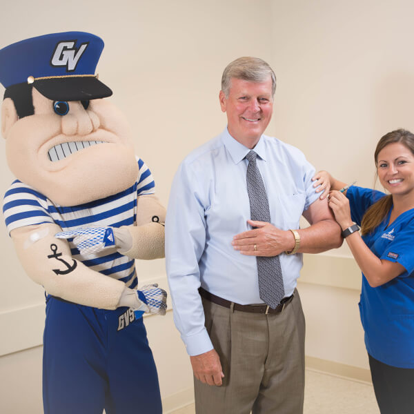 Louie the Laker, President Haas and nursing student