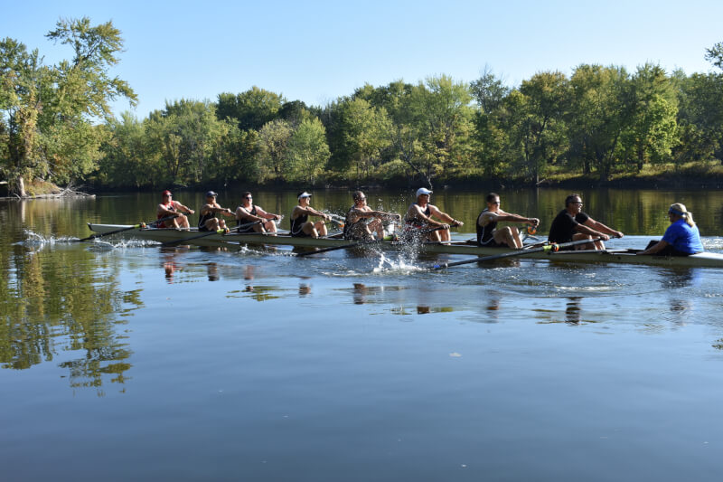  The crew rows along the Grand River.