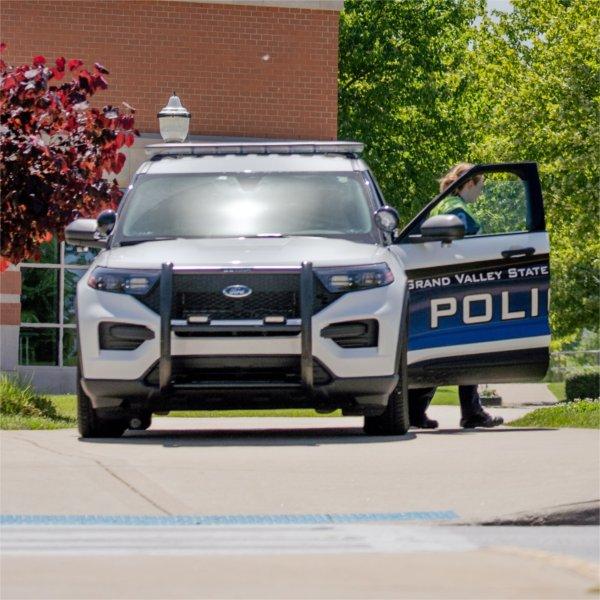 A GV police officer waiting to facilitate traffic