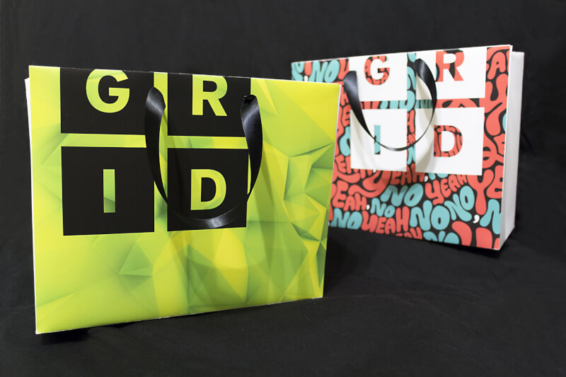 A sample gift bag from the fictional Grand Rapids Institute of Design designed by Kendra Smith for "x-height."
