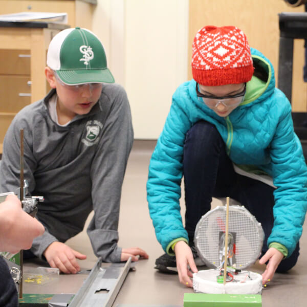 Students testing their hover craft during a Science Olympiad competition.