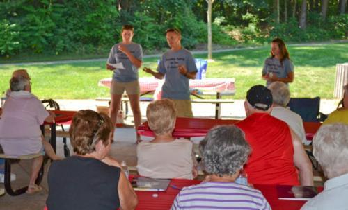 Students present information at the Healthy Aging in the Community Fair in Grand Haven.