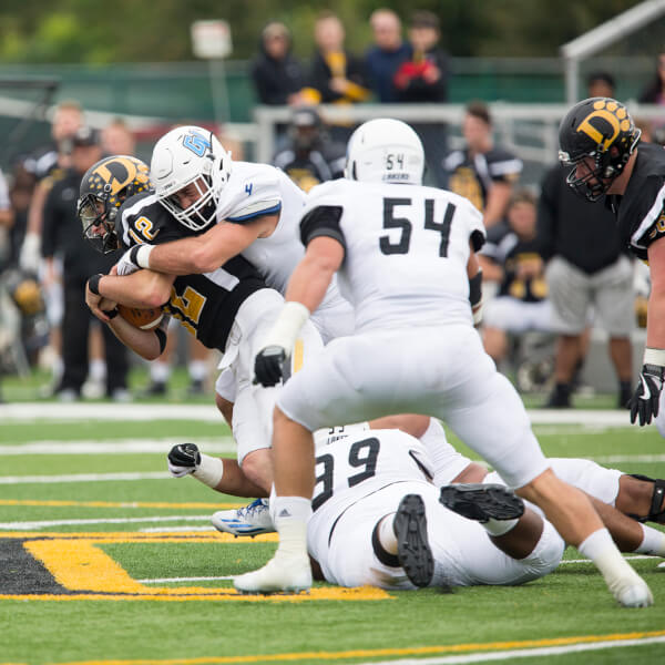 Photo courtesy GVSU Sports Information  Alton Voss makes a tackle against Ohio Dominican. Voss was profiled in a Detroit Free Press story.