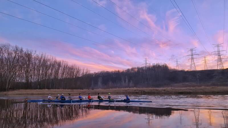 Students rowing on the Grand River.