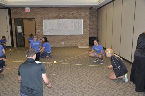 Fellows take part in a team-building exercise during orientation for the Cook Leadership Academy