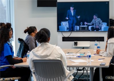 REP4 students watch a livestream of the President Philomena V. Mantella's President's Forum with Carla Harris