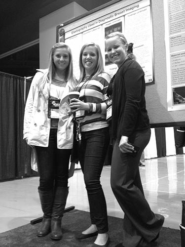 From left are Paige Keech, Brooke Jorgenson and Kelsey Miller at a national sonography conference. Not pictured is Kaylee Kellogg.