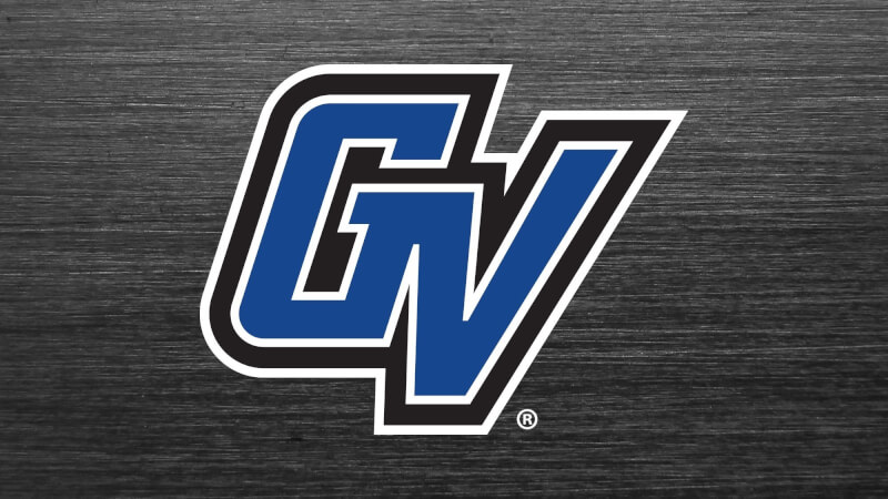 A blue and white Grand Valley athletics logo in an italic font on a grey heathered background. A registration mark is in the lower right of the logo.