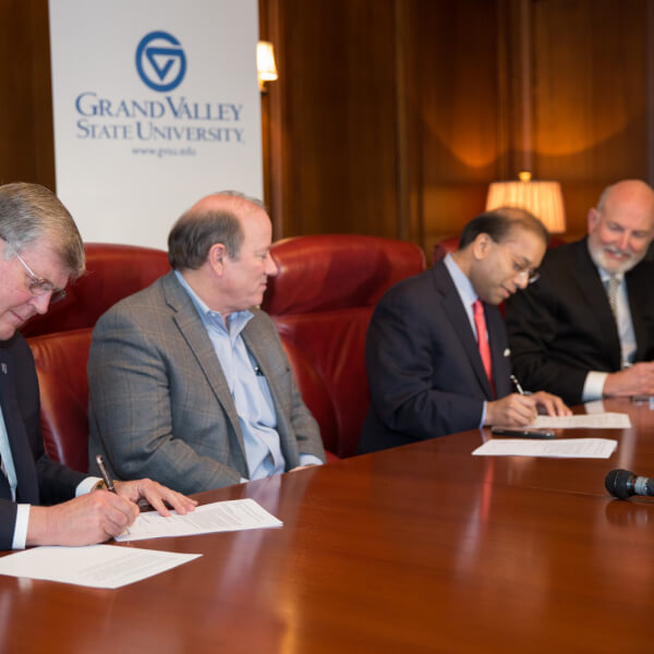 From left: President Thomas J. Haas, Mayor Mike Duggan, Sandy Baruah, Peter Remington