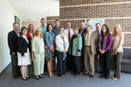 Pictured is the Internationalization Task Force, along with ACE representative Barbara Hill, fourth from left. The committee is chaired by Mark Schaub, back, third from right, and Carol Sanchez, front, third from left.