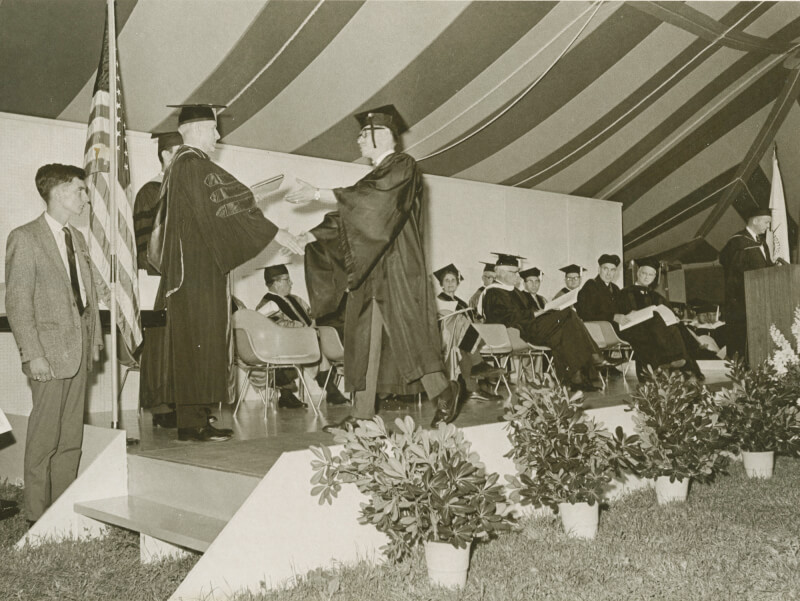 student receiving a diploma