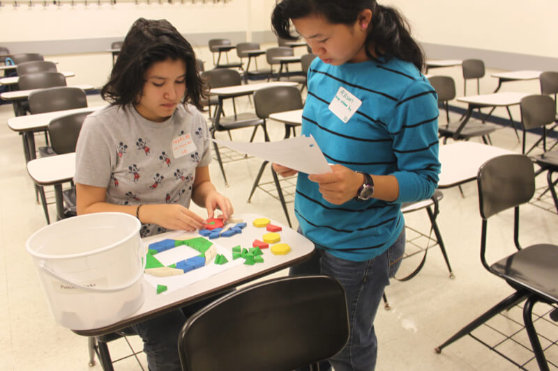 Ottawa High School students working on the Team Challenge with pattern blocks. Photo courtesy of the RMSC.