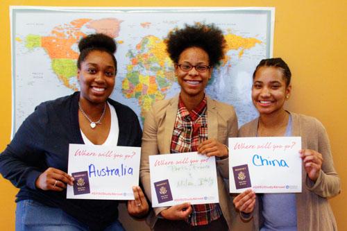 From left are Zoie Williams, Nina Hatter and Angel Williams, who earned scholarships to purchase passports.